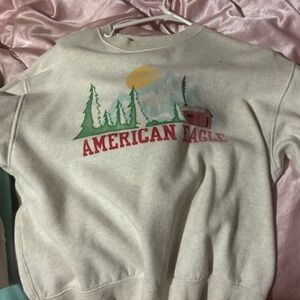 American Eagle Outfitters Cream Graphic Crewneck Sweater
